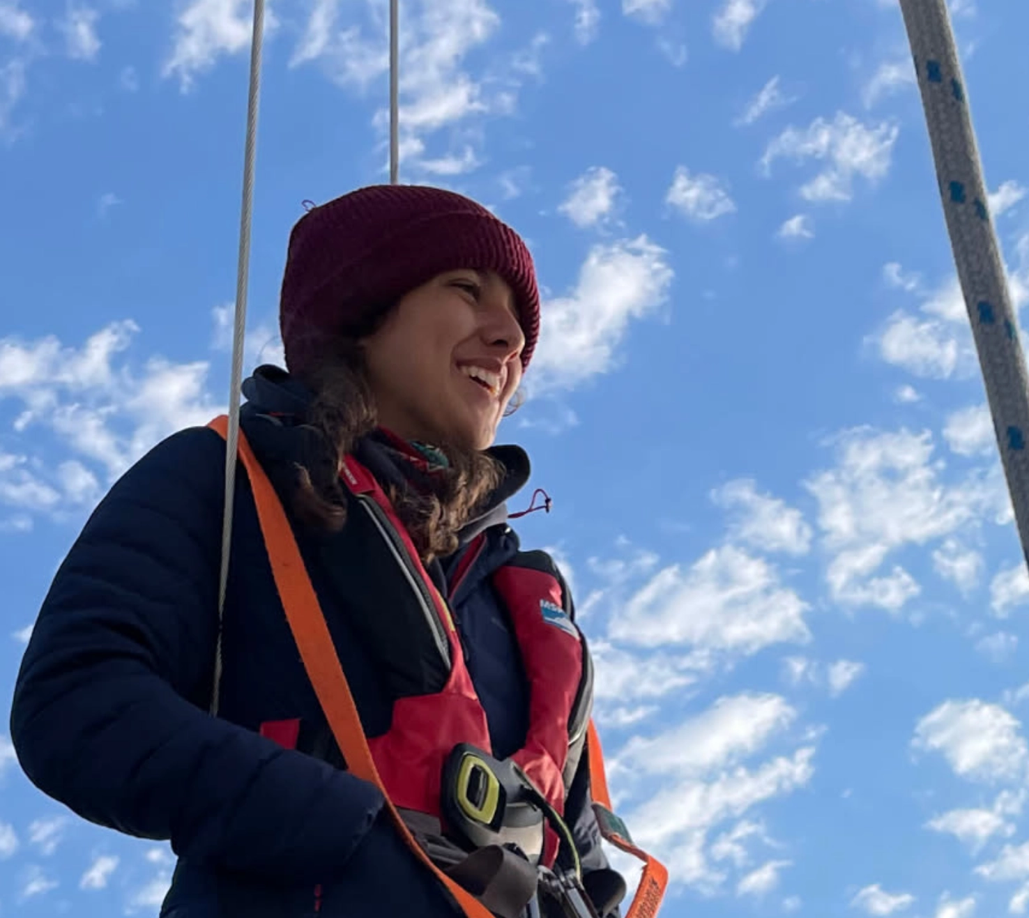 Young sailor smiling on deck